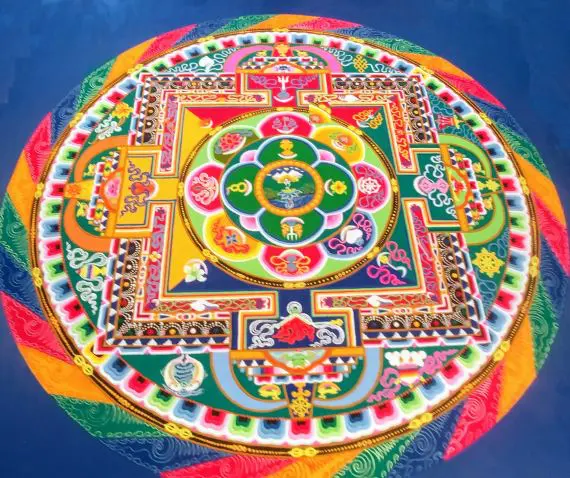 A colorful, patterned round rug