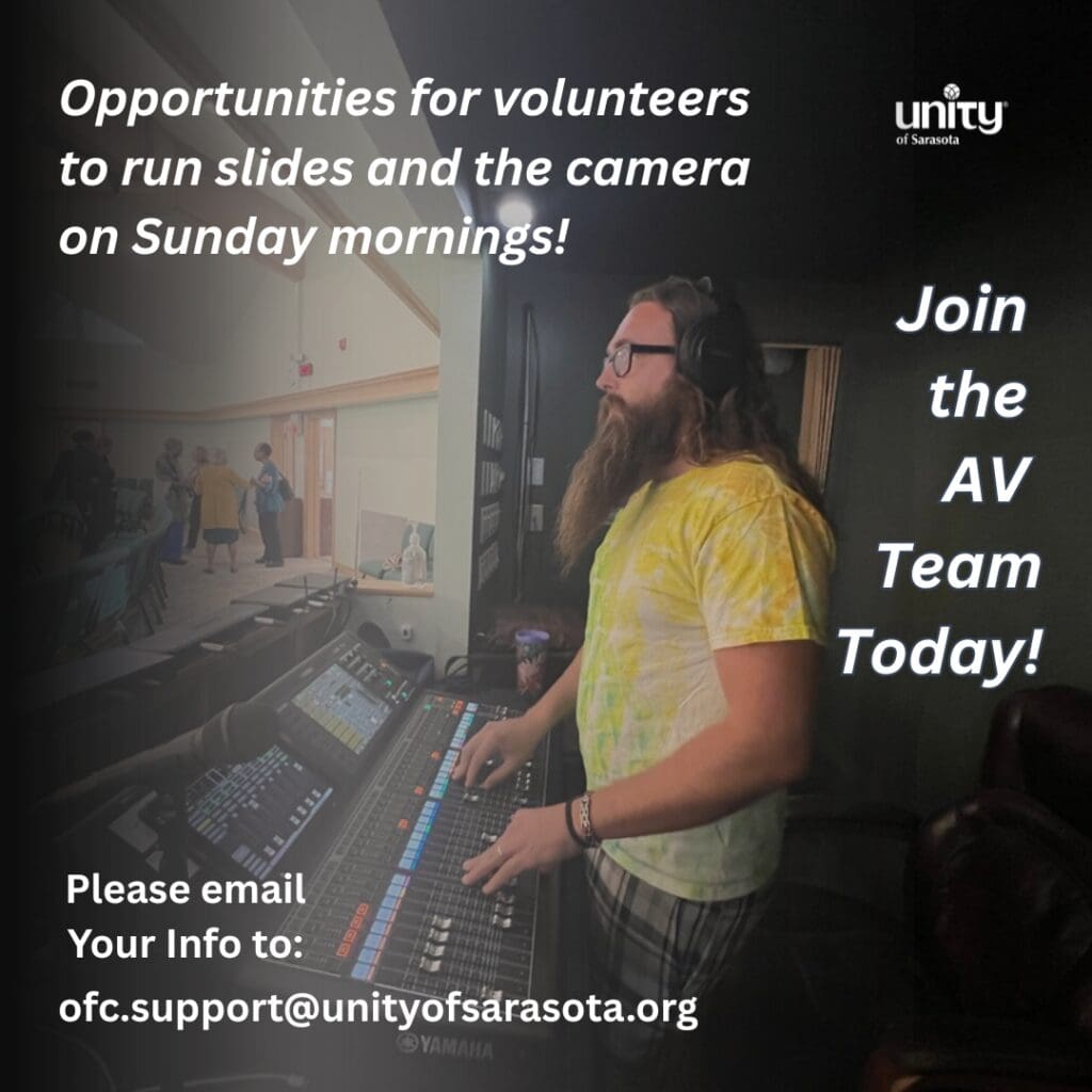 Volunteer operating soundboard in AV booth